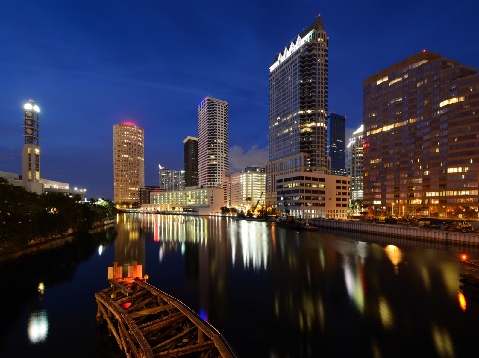 Downtown Tampa skyline lit at night over the water